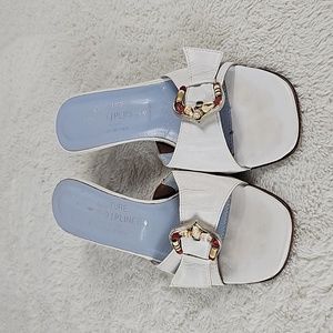 Donald J Pliner Couture White shell sandals.